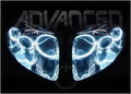 Toyota Supra headlights with white LED halo rings.