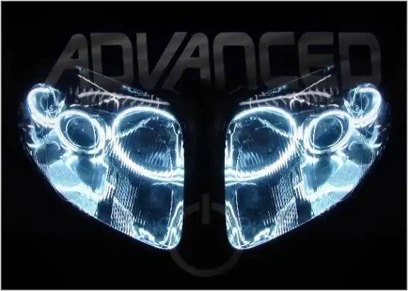 Toyota Supra headlights with white LED halo rings.