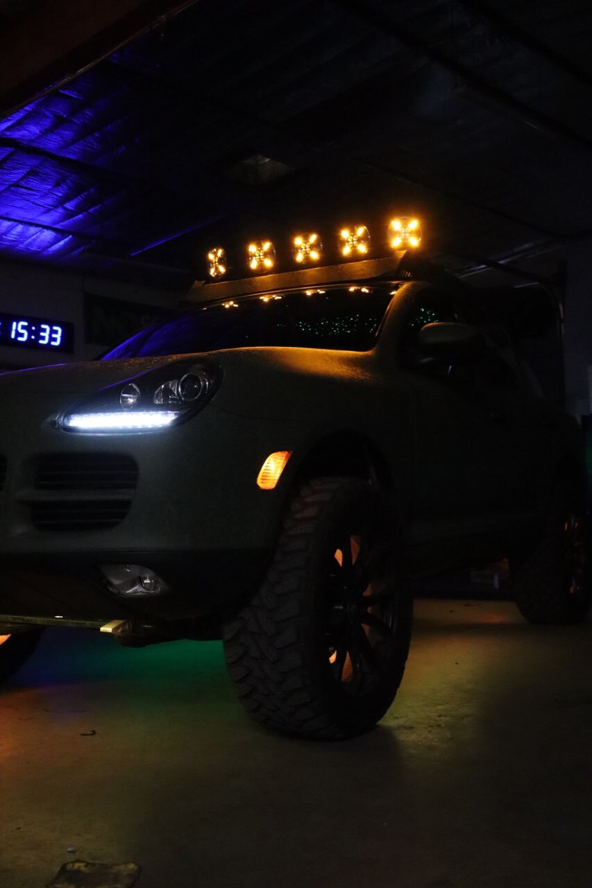 Porsche with 5 Multifunction LED Spotlights installed on the roof.