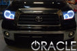 Front end of a Toyota Tundra with white LED headlight halo rings installed.