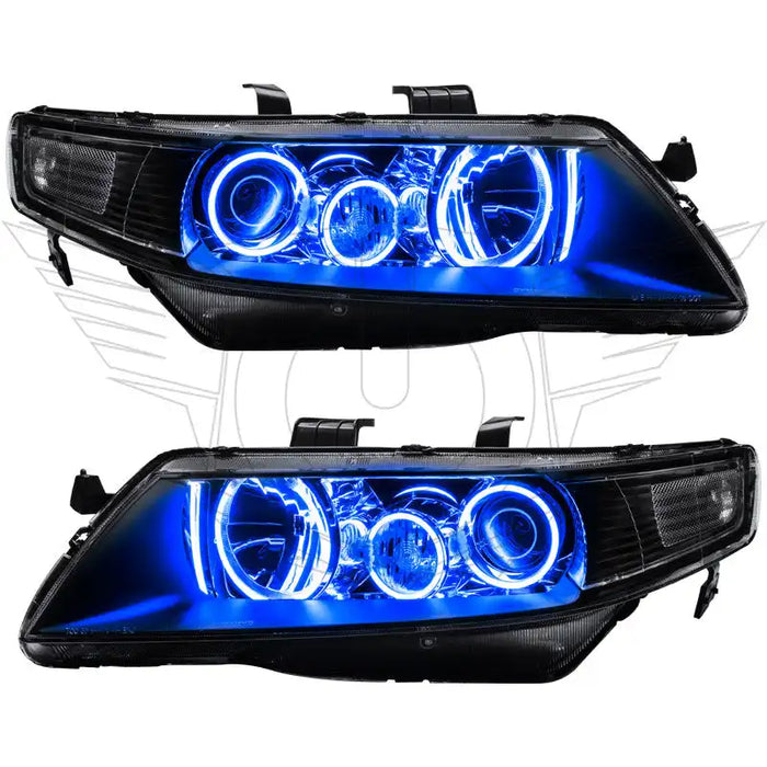 Acura TSX headlights with blue LED halo rings.