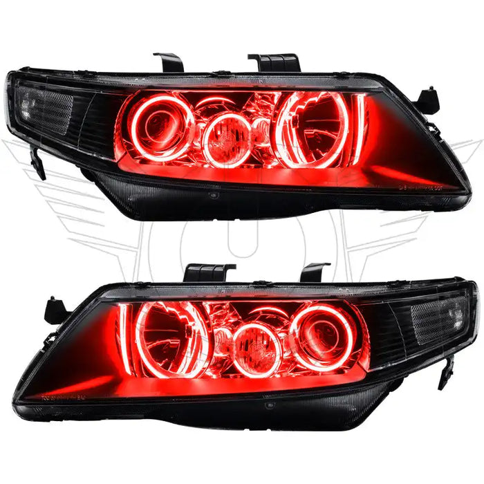 Acura TSX headlights with red LED halo rings.
