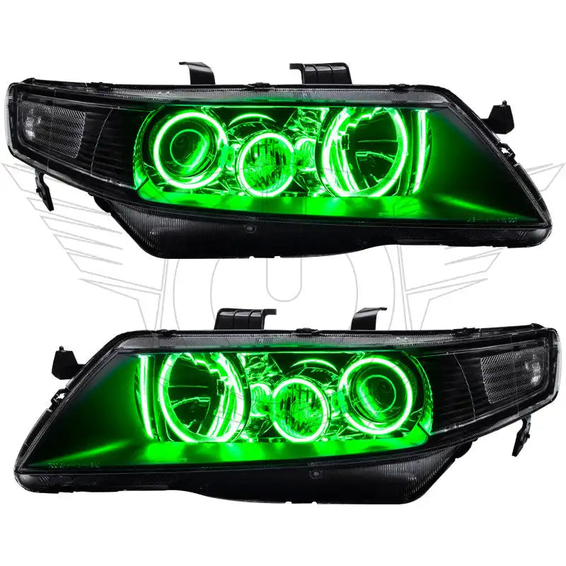 Acura TSX headlights with green LED halo rings.