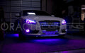 White Audi with purple LED lighting products.