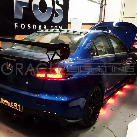 Mitsubishi with red underbody bolt lights