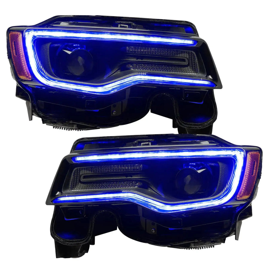 Jeep Grand Cherokee headlights with blue DRLs.