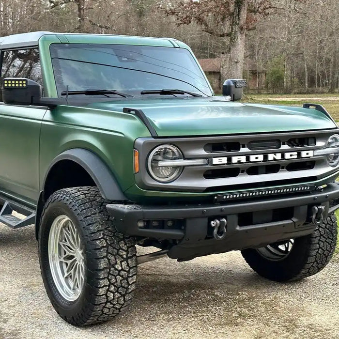 Three quarters view of a green Ford Bronco with LED Off-Road Side Mirrors installed.