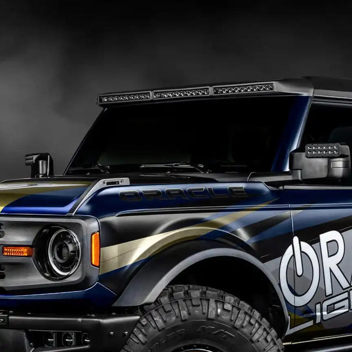 Close-up of Integrated Windshield Roof LED Light Bar System installed on the ORACLE Lighting Ford Bronco.