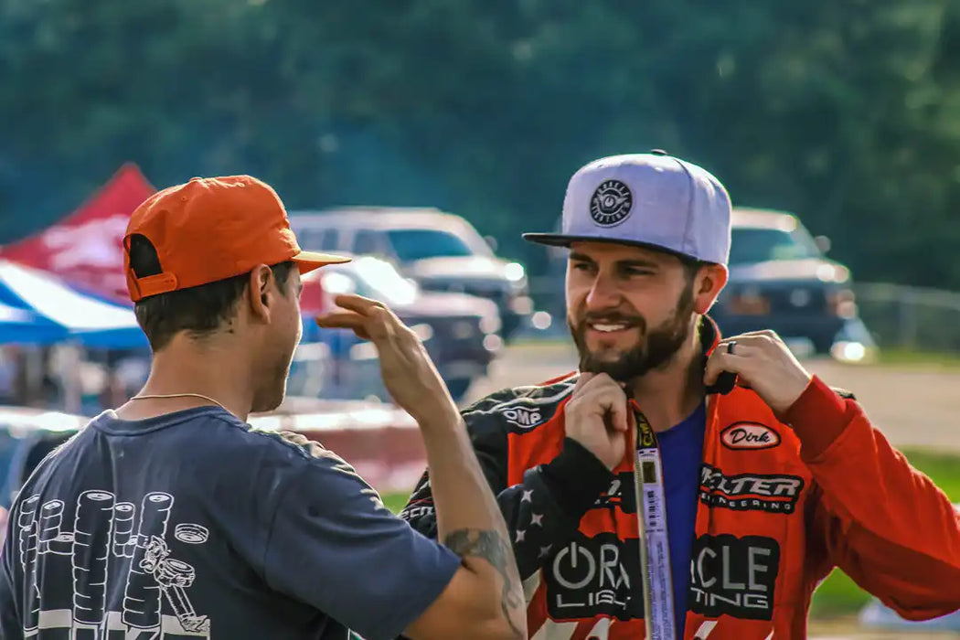 Man wearing ORACLE Lighting Official Snap-Back Hat