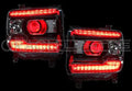 Headlights with red demon eye projectors and DRLs.