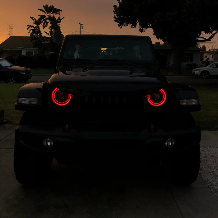 Front end of a Jeep with ColorSHIFT Oculus Headlights installed.