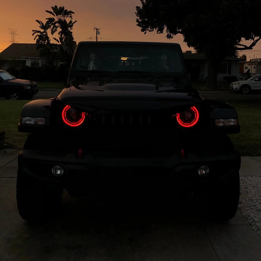 Front end of a Jeep with ColorSHIFT Oculus Headlights installed.