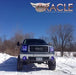 Front view of a GMC Sierra with blue LED fog light and headlight halo rings installed.
