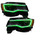 Jeep Grand Cherokee headlights with green DRLs.