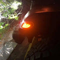 Close-up of "Smoked Lens" LED Front Sidemarkers installed on a Jeep.