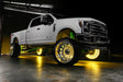 White Ford Superduty with yellow LED wheel rings.