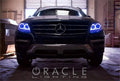 Front end of a Mercedez-Benz ML Class with blue LED headlight halos installed.