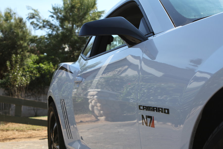 Close-up of Concept Side Mirror installed on a Chevrolet Camaro.