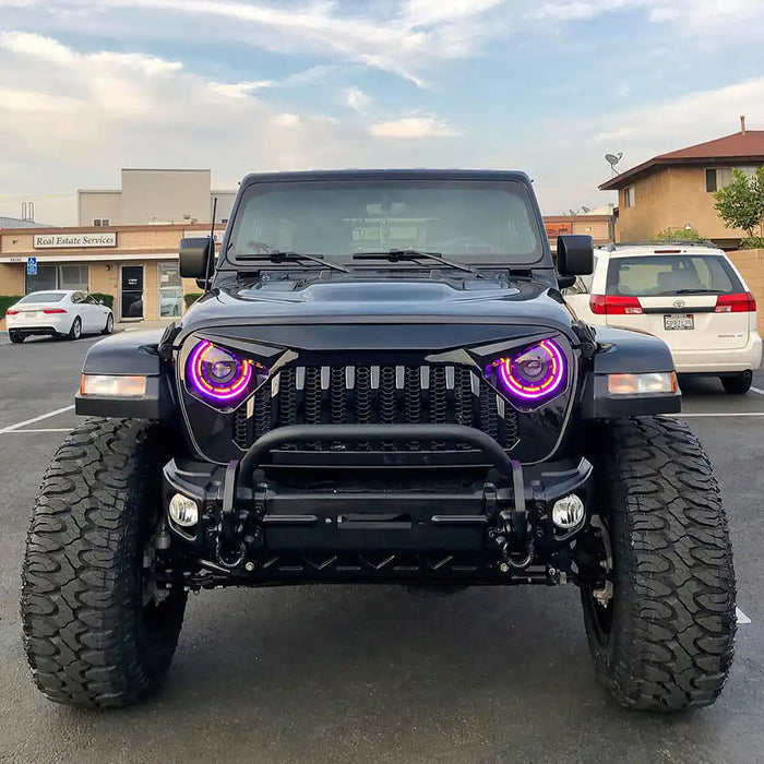 Front end of a Jeep with ColorSHIFT Oculus Headlights installed.