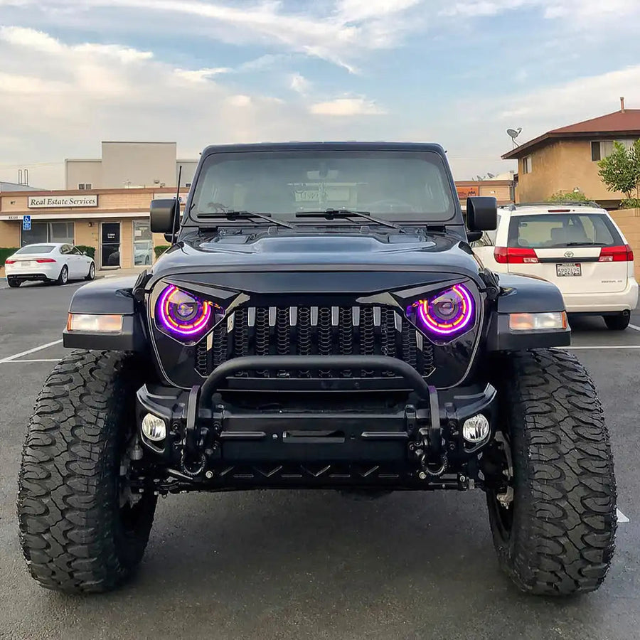 Front end of a Jeep with ColorSHIFT Oculus Headlights installed.