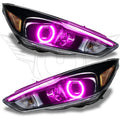 Ford Focus headlights with pink halo rings.
