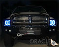 Front end of a Dodge Ram with white LED headlight halo rings installed.