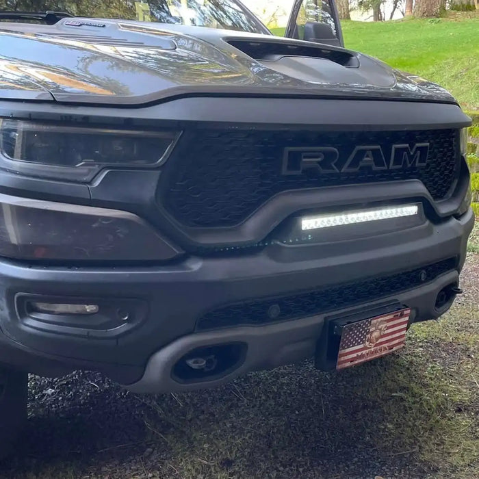 Front end of a RAM TRX with Front Bumper Flush LED Light Bar System installed.