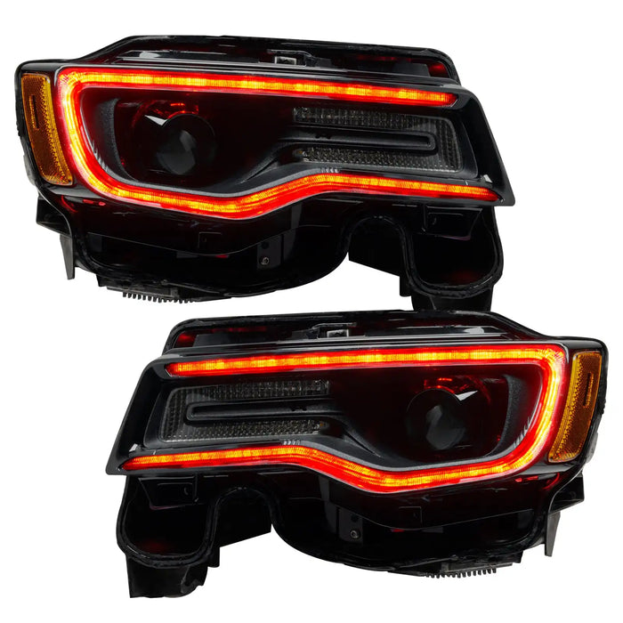 Jeep Grand Cherokee headlights with red DRLs.