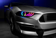 Close-up of Ford Mustang headlight with rainbow LEDs.