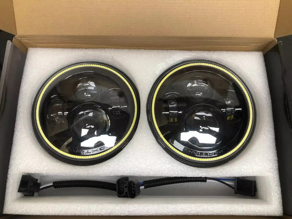 USED ORACLE 7" HIGH POWERED BLACK LED HEADLIGHTS WITH WHITE LED HALOS 5769-001 | ORACLE Outlet | GRADE B