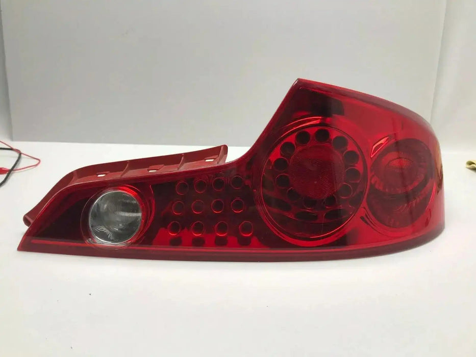 03-05 INFINITI G35 COUPE RIGHT PASSENGER TL REAR OEM FACTORY MADE IN JAPAN | ORACLE Outlet | GRADE B