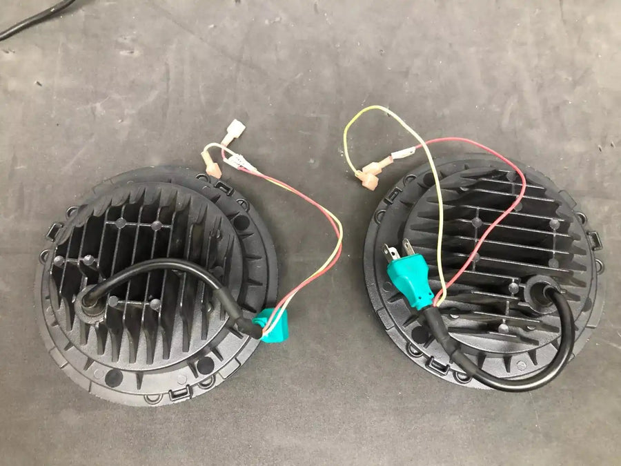 USED 7" HIGH POWERED BLACK LED HEADLIGHTS WITH WHITE LED HALOS 5769-001 | ORACLE Outlet | GRADE B
