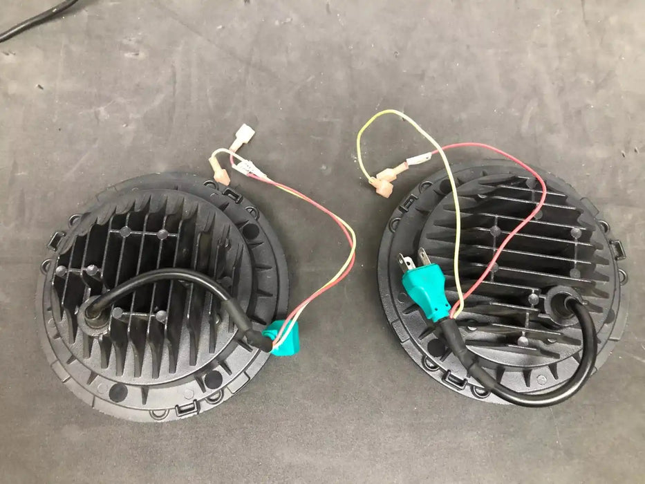 USED ORACLE 7" HIGH POWERED BLACK LED HEADLIGHTS WITH WHITE LED HALOS 5769-001 | ORACLE Outlet | GRADE B