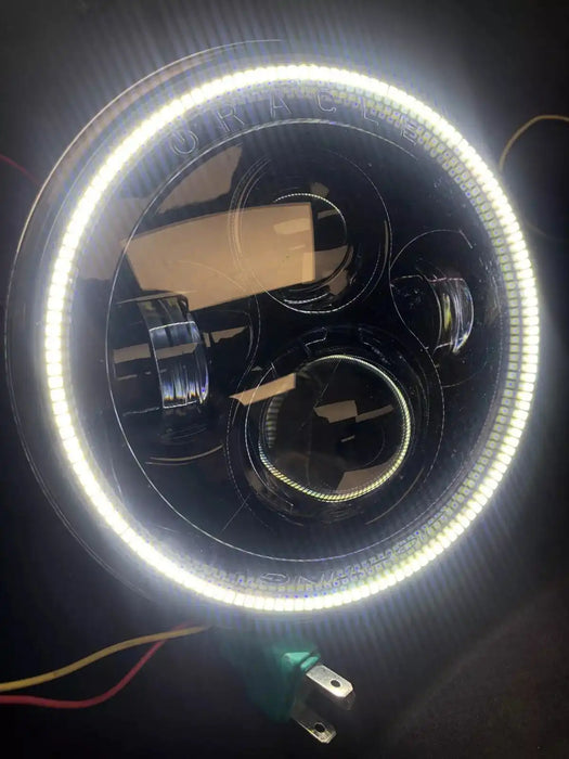 USED ORACLE 7" HIGH POWERED BLACK LED HEADLIGHTS WITH WHITE LED HALOS 5769-001 | ORACLE Outlet | GRADE B