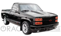Three quarters view of a Chevrolet Blazer with red LED headlight halos installed.