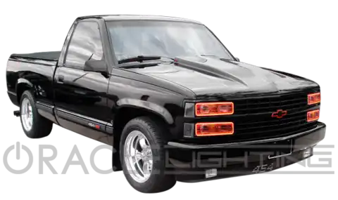 Three quarters view of a truck with red LED halo rings installed.