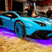 Blue Lamborghini with purple LED underbody kit.