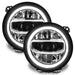 Jeep Wrangler JL headlights with white DRLs.