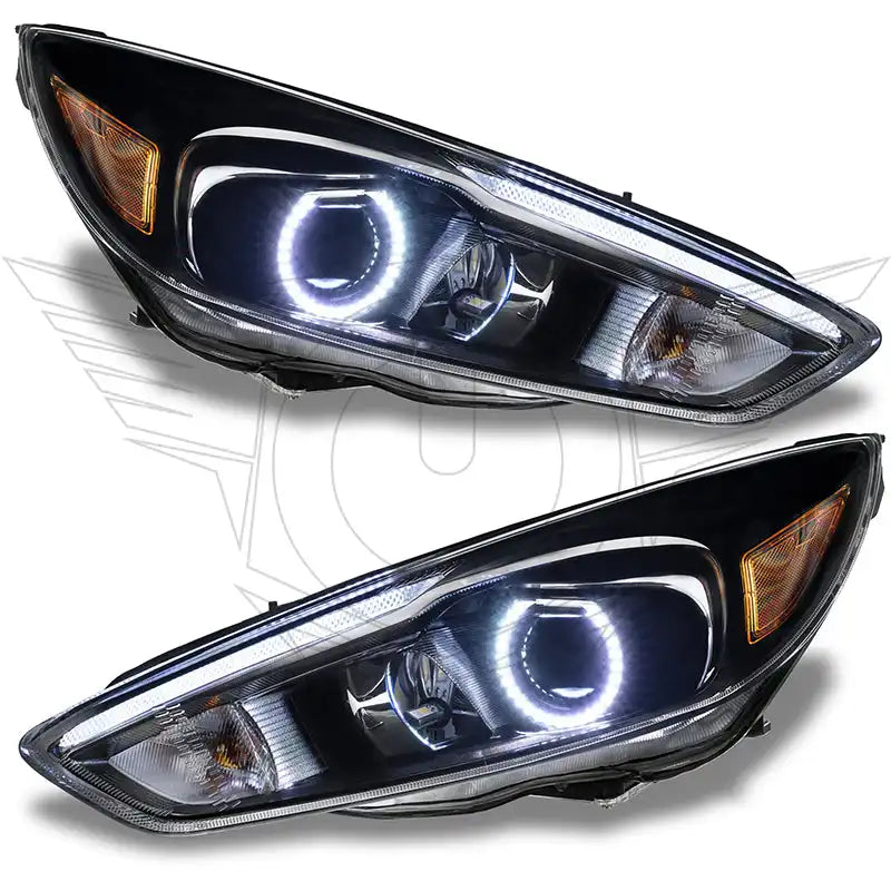 Ford Focus headlights with white halo rings.
