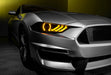 Close-up of Ford Mustang headlight with yellow LEDs.