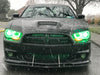 Front end of a black Dodge Charger with green LED headlight halo rings installed.