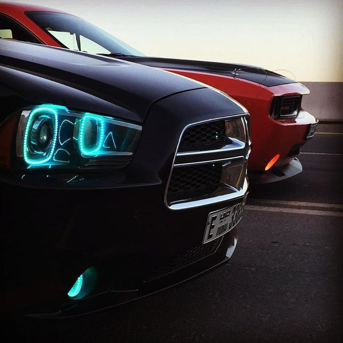 Close-up of black charger with cyan halos.