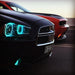 Close-up of black charger with cyan halos