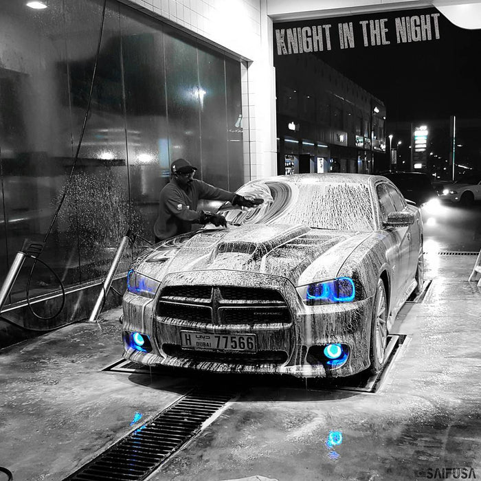 Charger in a car wash with blue halos