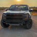 Front view of a Ford Raptor with 2015-2020 Ford F-150 LED Off-Road Side Mirrors installed.