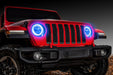 Front end of a red Jeep Wrangler JL with blue headlight DRLs on.