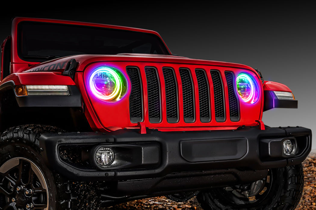 Front end of a red Jeep with rainbow LED Surface Mount Headlight Halos.