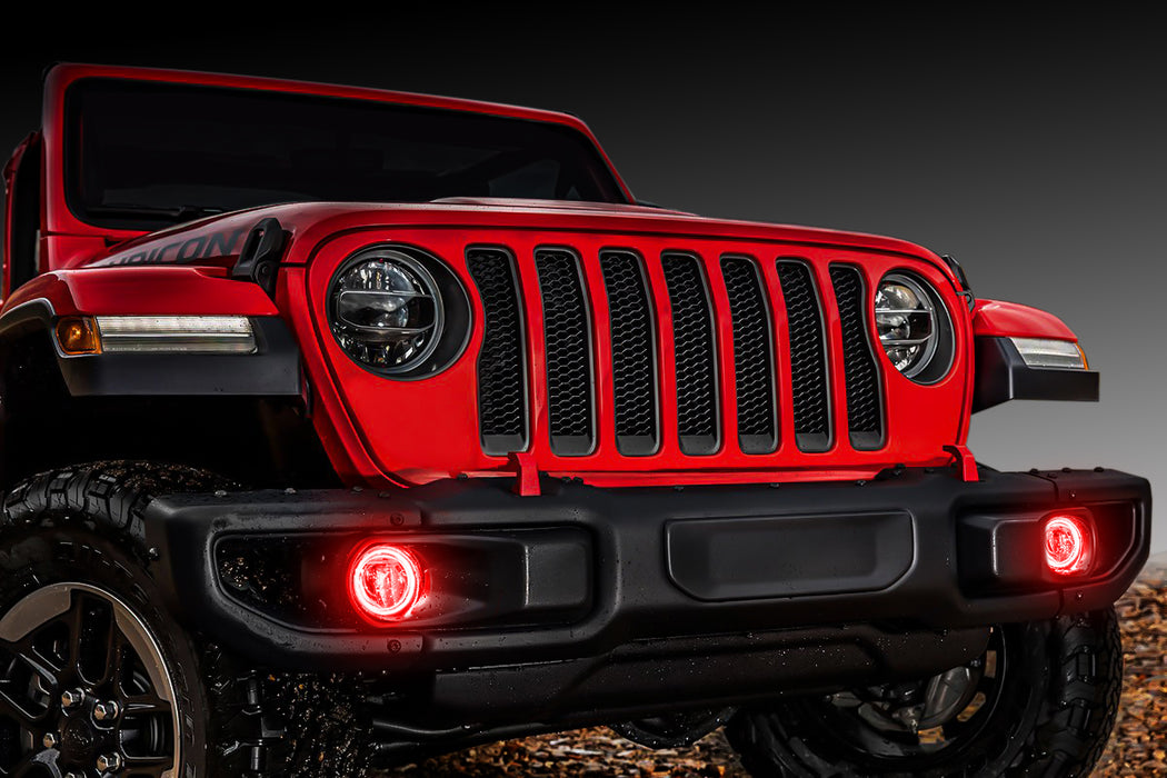 Red Jeep Gladiator with red fog light halos installed.