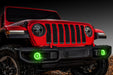 Front end of a red Jeep with green LED Surface Mount Fog Light Halos.