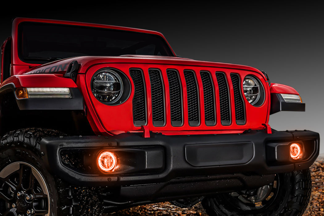 Front end of a red Jeep with amber LED Surface Mount Fog Light Halos.